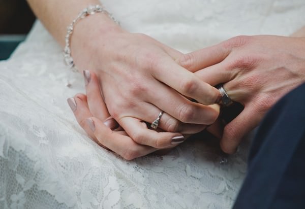 wedding couple holding hands