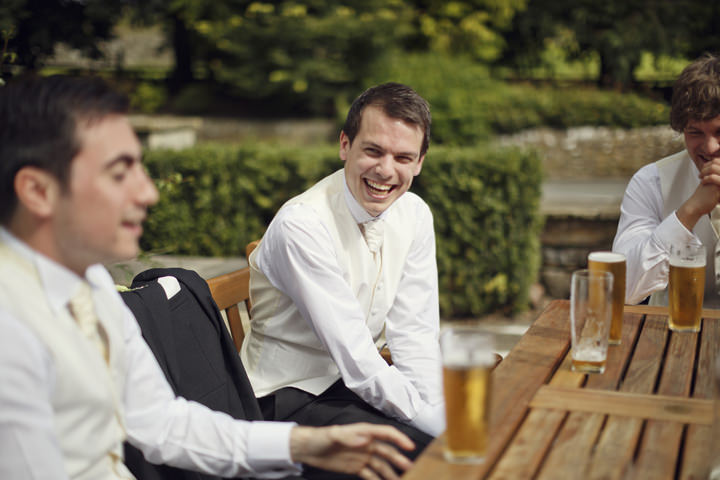 groom having  a drink before the wedding