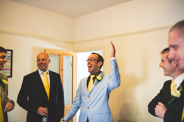 groomsmen in pale blue jacket