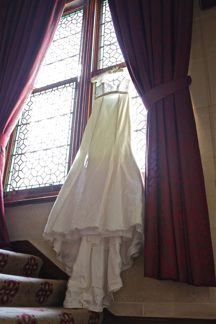 wedding dress hanging up