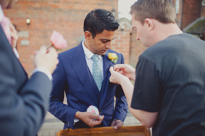 groom with button hole