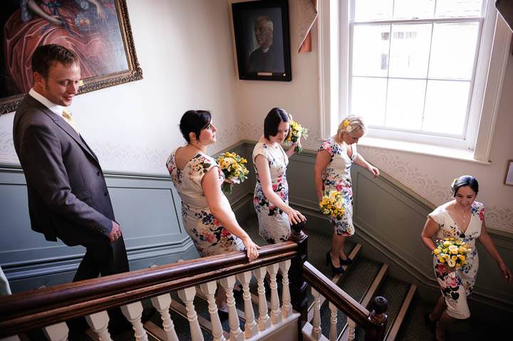 bridesmaids leaving wedding ceremony