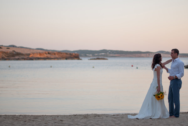 ibiza couple on the beach on their wedding day