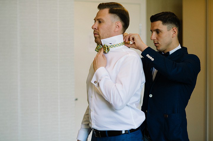 Modern Lithuanian groom wearing bow tie Wedding By Diana Zak Photography