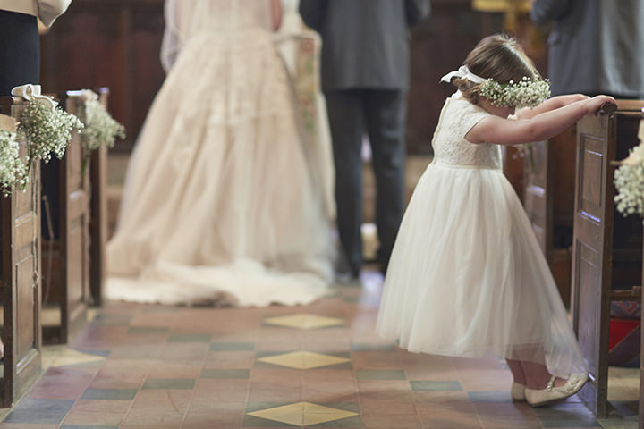 Barn Wedding at Dodford Manor in Northamptonshire flower girl