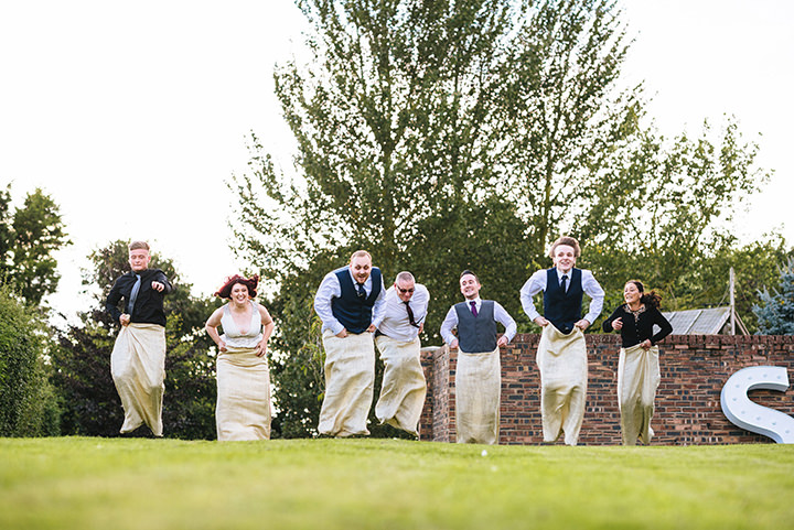 Louise and Sam's Gold and White Outdoors Wedding with an Evening Pool Party sack races