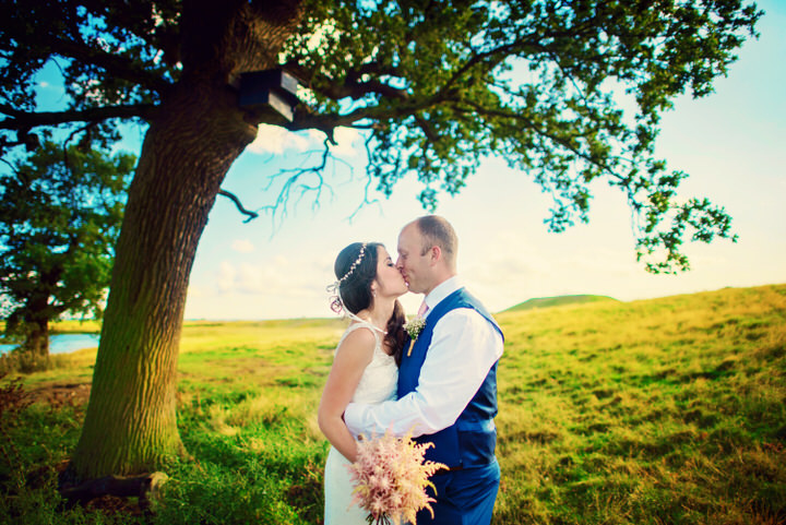 Homespun Barn Wedding bride and groom at Elmley Nature Reserve in Kent By Photography By Vicki