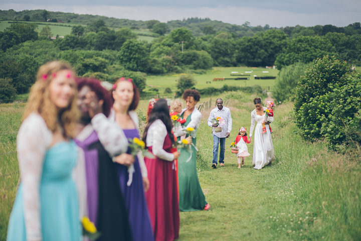 Free Spirited Outdoor Meadow Wedding by Larissa Joice Photography, with flags, wild flowers and a picnic