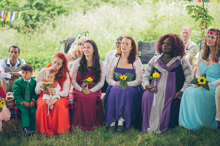 Free Spirited Outdoor Meadow Wedding by Larissa Joice Photography, with flags, wild flowers and a picnic