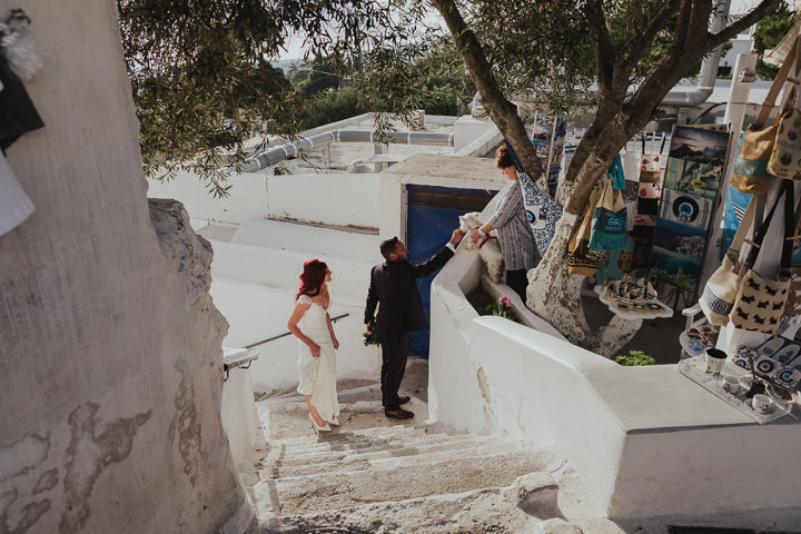 Elegant Santorini Wedding by Steve Fuller Photo, with white roses, an essence of australia gown and a helicopter ride