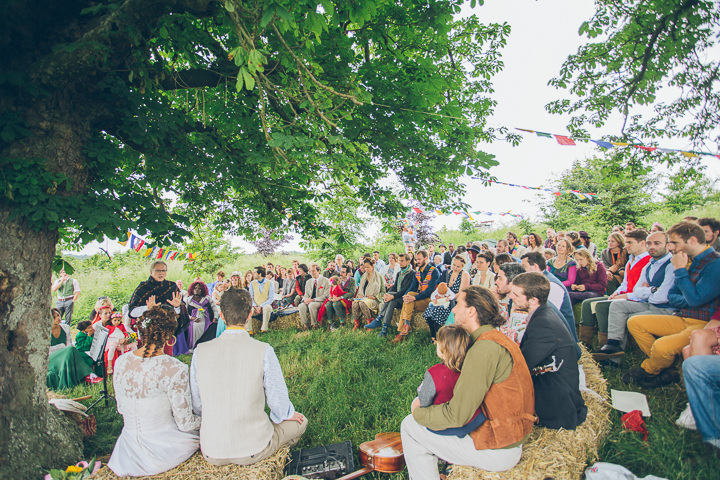 Free Spirited Outdoor Meadow Wedding by Larissa Joice Photography, with flags, wild flowers and a picnic