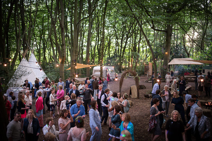 Family Affair Wonderful Woodland Wedding by Lucy Noble, with a Jenny Packham dress, bunting, a fire pit and dancing under the stars.