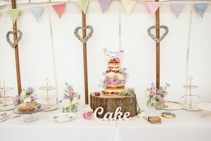 Pretty Country Pastel Homemade Hertfordshire Wedding by Sarah Elliot Photography, with a cake table, bunting and outdoor games.