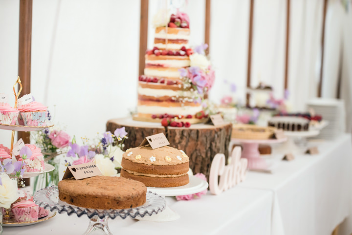 Pretty Country Pastel Homemade Hertfordshire Wedding by Sarah Elliot Photography, with a cake table, bunting and outdoor games.