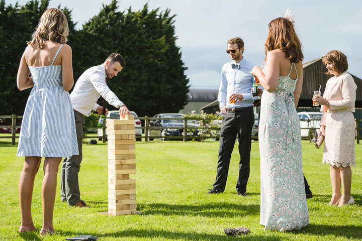 Pretty Country Pastel Homemade Hertfordshire Wedding by Sarah Elliot Photography, with a cake table, bunting and outdoor games.