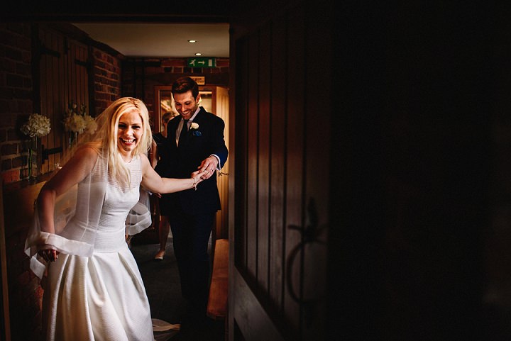 Elegant Whimsy Flower Filled White and Rose Gold Wedding by Andy Gaines