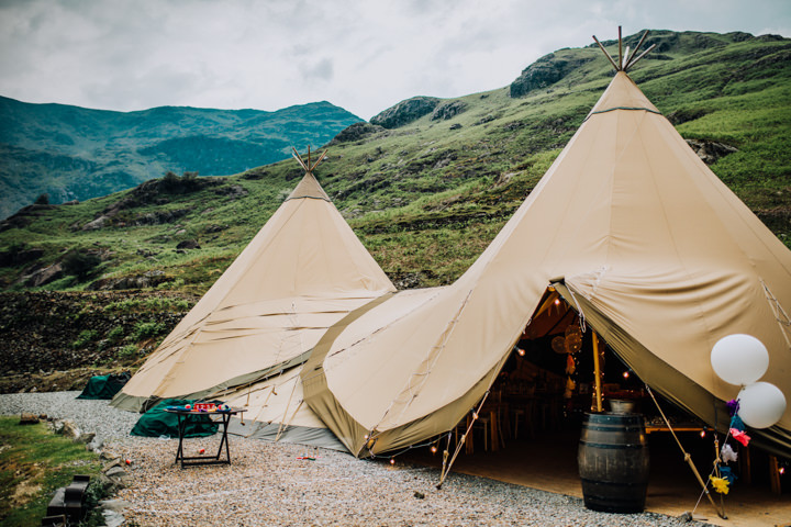 Danielle and Mike's Rainy Boho Festival Themed Wedding in The Lake District by Clara Cooper Photography