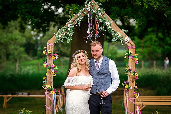 Kathryn and Andrew's Colourful Ribbon Filled Festival Vibe Glamping Wedding in Norfolk by Andy Kahumbu