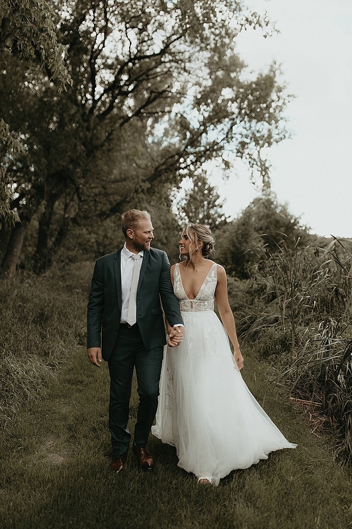 Emily and Wyatt’s Flower Filled Minnesota Wedding With Lots of Handmade Decor. By Sabrina Benning Co 